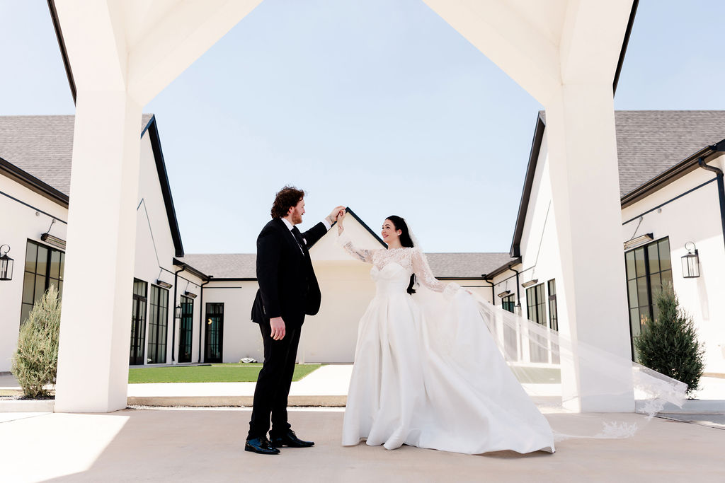 Couple dances in front of Grace Manor Wedding Venue